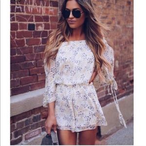Floral chiffon off the shoulder romper.